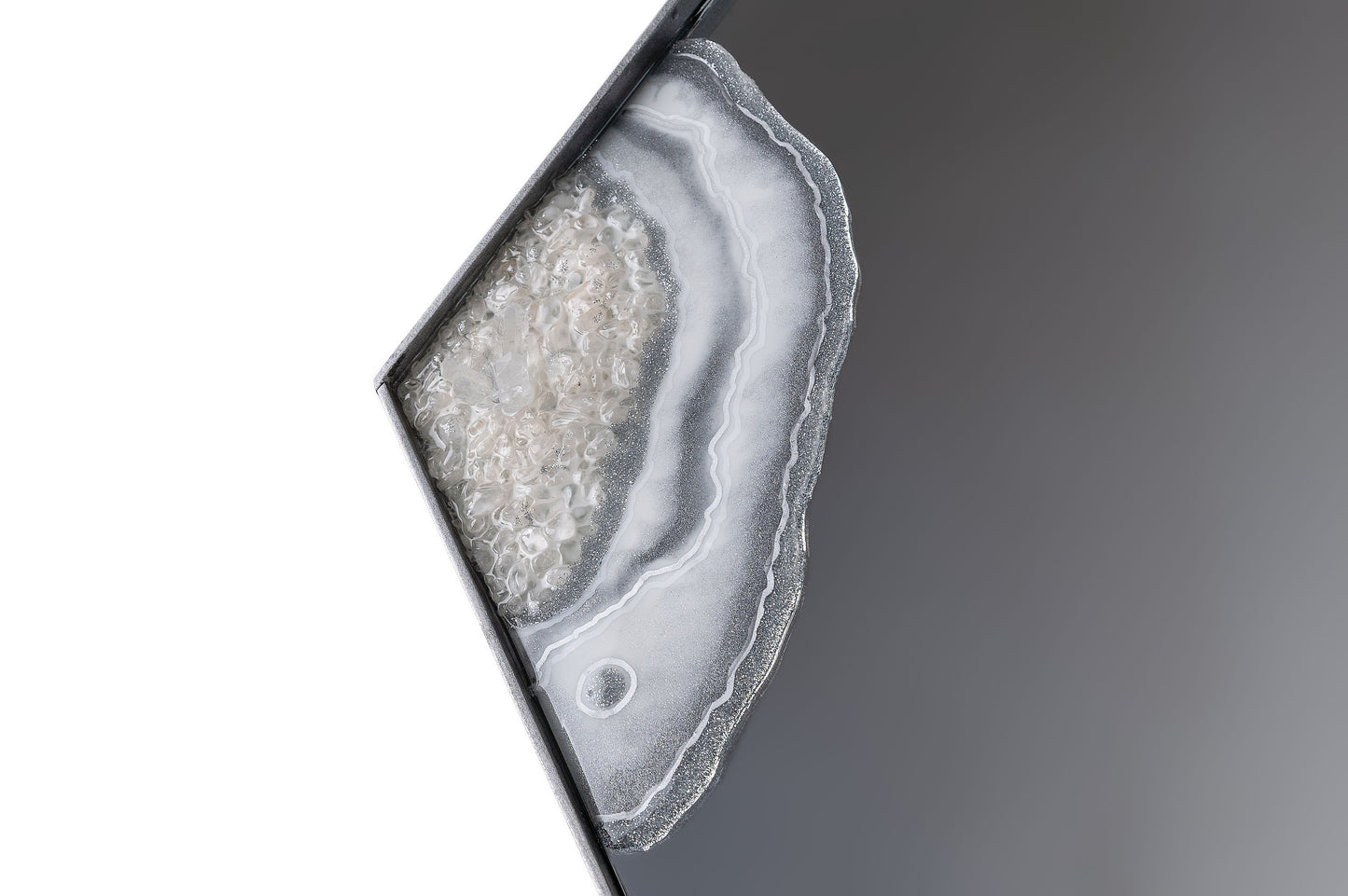 Espejo hexagonal plateado