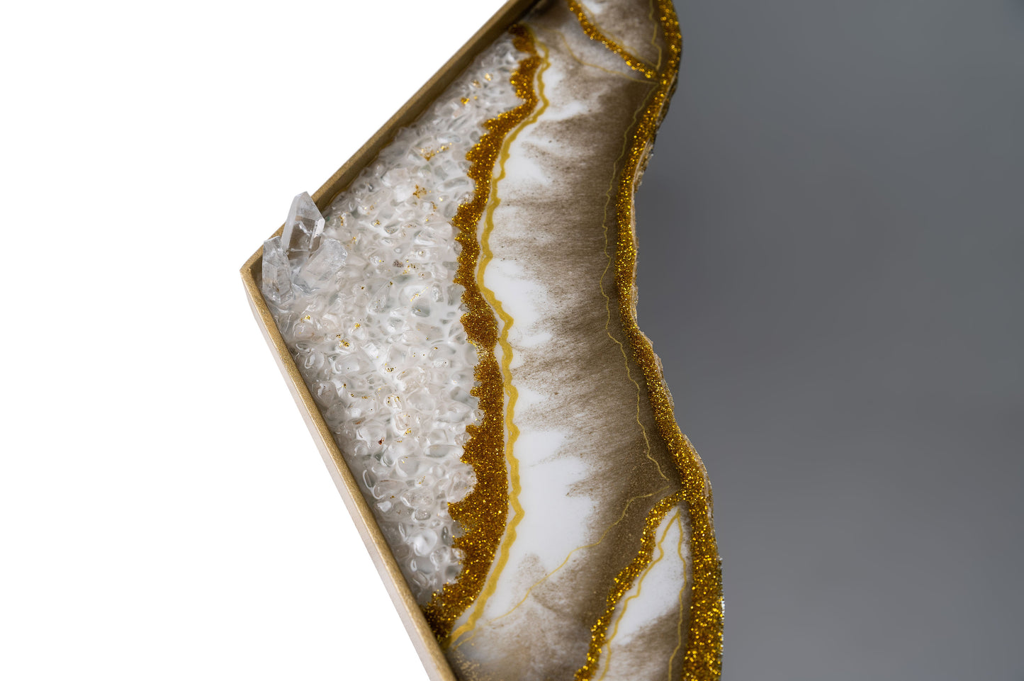 Espejo hexagonal dorado